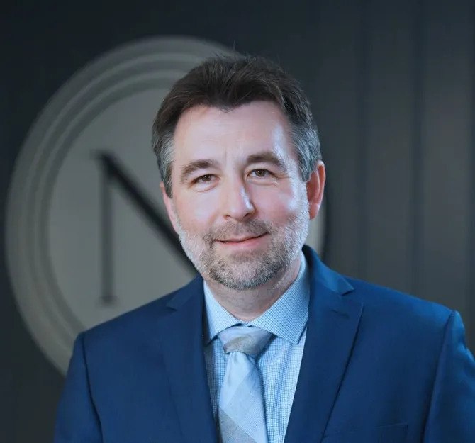 Portrait of Chris Castello, MSN, APRN, FNP-C, co-founder of NeonData